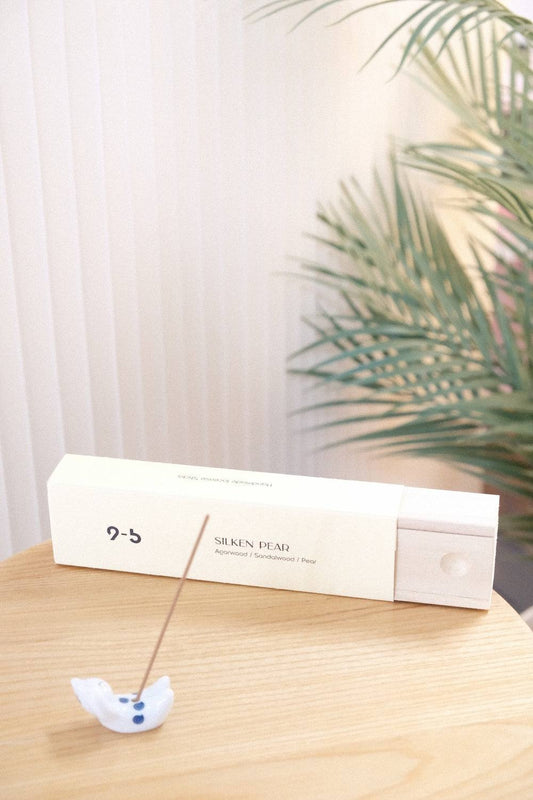 Silken Pear incense box with lit stick in ceramic holder