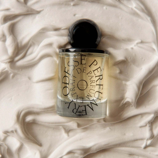 Odesse Fig Lane Extrait De Parfum bottle with fig, coconut, and pear notes in 50ml size