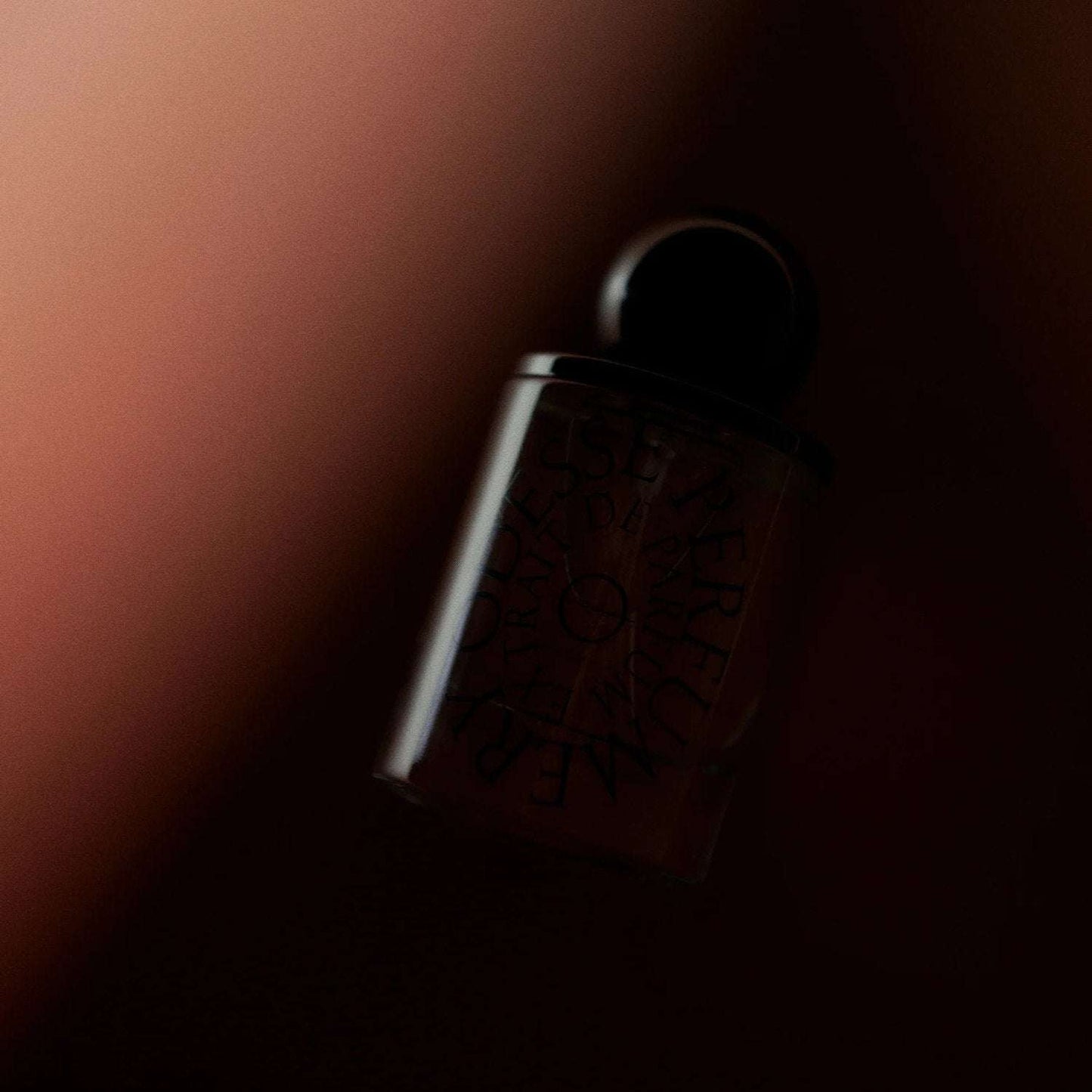 Bottle of Odesse The Valley Extrait De Parfum with cannabis, incense, and amber notes