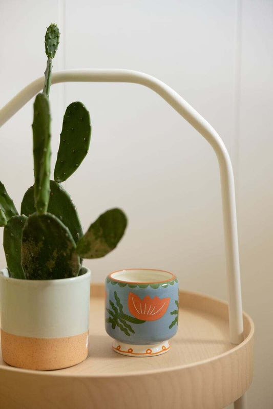 Paddywax A Dopo cactus flower candle in hand-painted ceramic vessel with floral scent