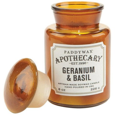 Paddywax Apothecary Geranium & Basil candle in amber glass jar with fresh herbal fragrance
