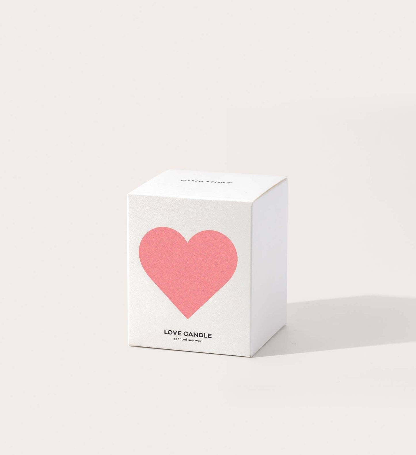 Pinkmint Candle Tipsy Kiss soy candle with orange, raspberry, neroli, jasmine, patchouli, and honey fragrance, hand-poured in Australia