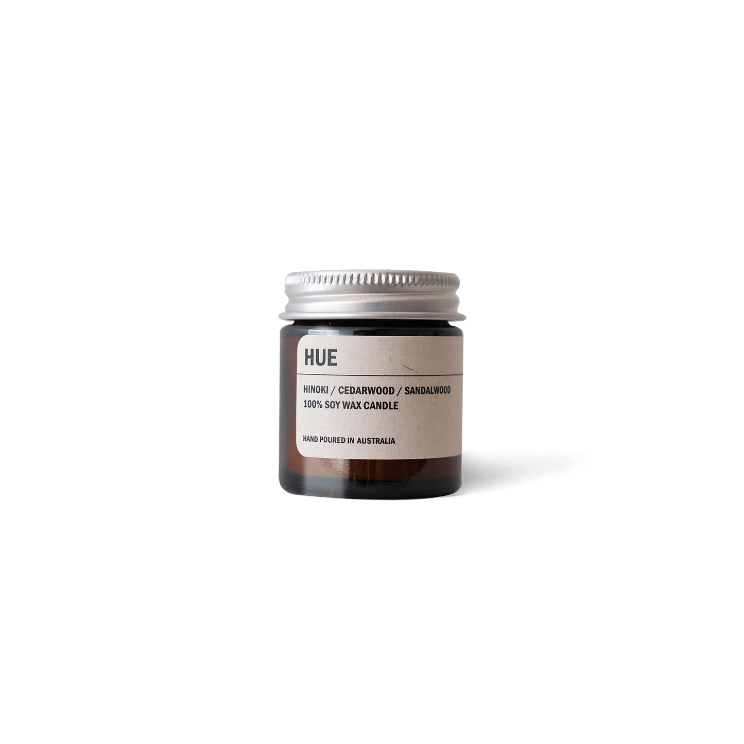 Posie Candle HUE with Hinoki, Cedarwood, and Sandalwood scent in amber glass jar
