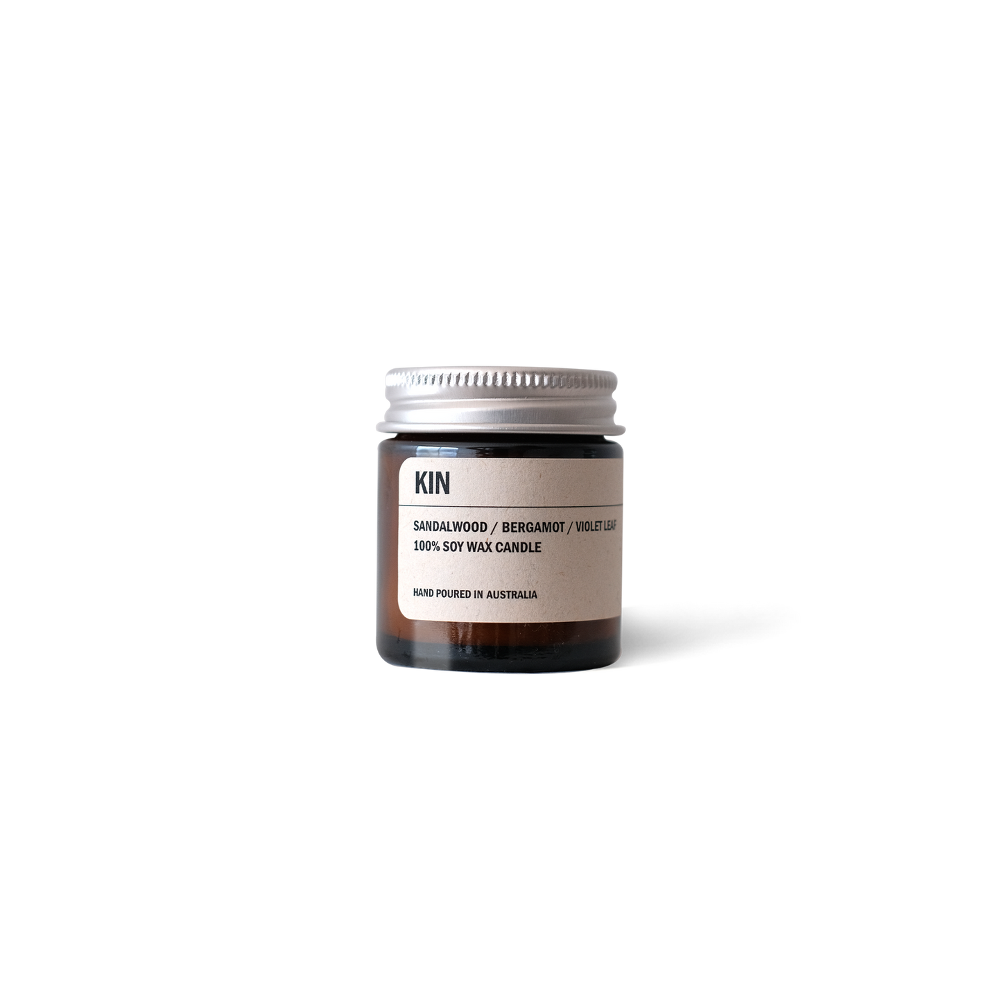 Posie Candle KIN sandalwood bergamot violet leaf in amber glass jar with aluminium lid