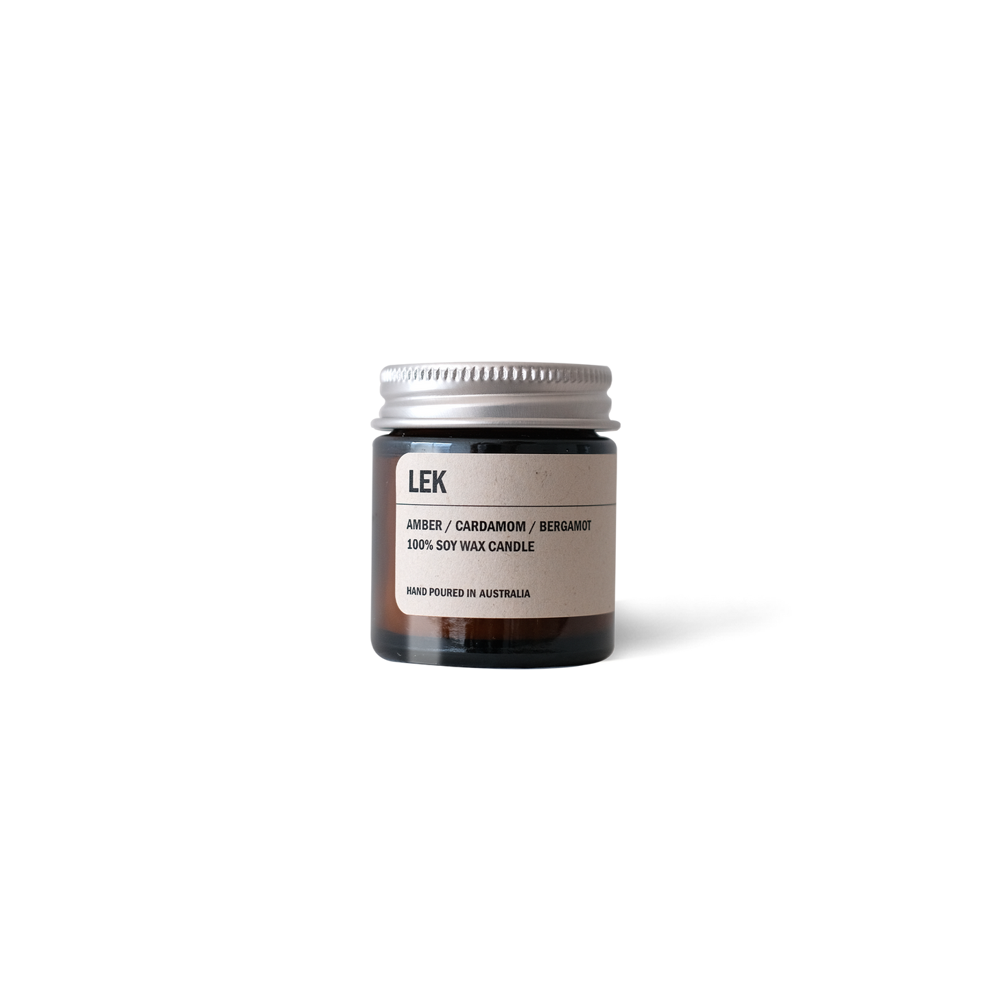 Posie Candle LEK amber glass jar with amber, cardamom, and bergamot scent