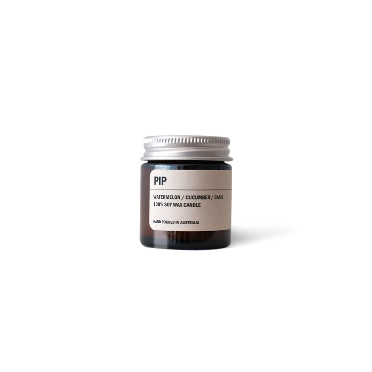 Amber glass Posie Candle with watermelon, cucumber, and basil scent in aluminium lid jar