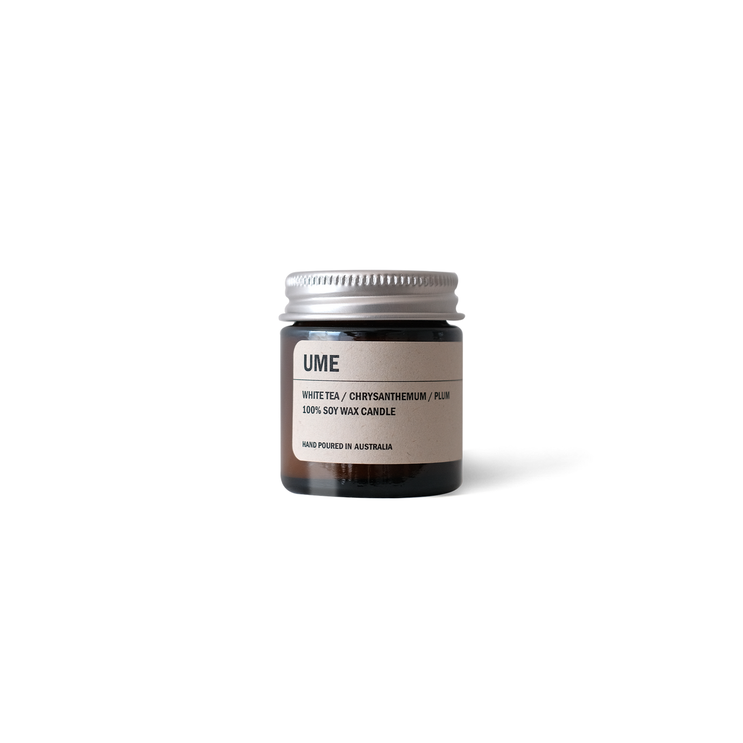 Posie Candle UME in amber jar with white tea, chrysanthemum, and plum scent