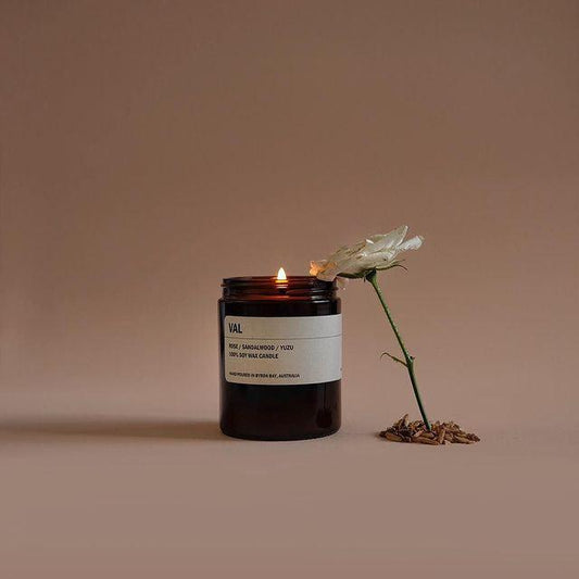 Posie Candle VAL in amber jar with rose sandalwood yuzu scent