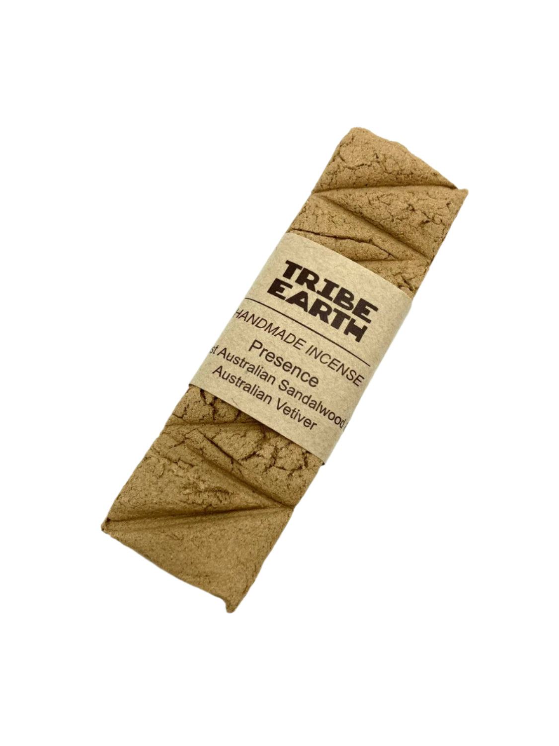Tribe Earth PRESENCE Handmade Incense Plank with Vetiver Grass and Sandalwood burning in a dish