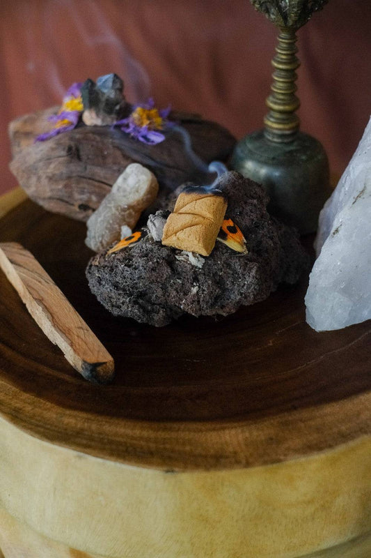 Tribe Earth ROSES Handmade Sandalwood and Moroccan Roses incense plank burning in a dish