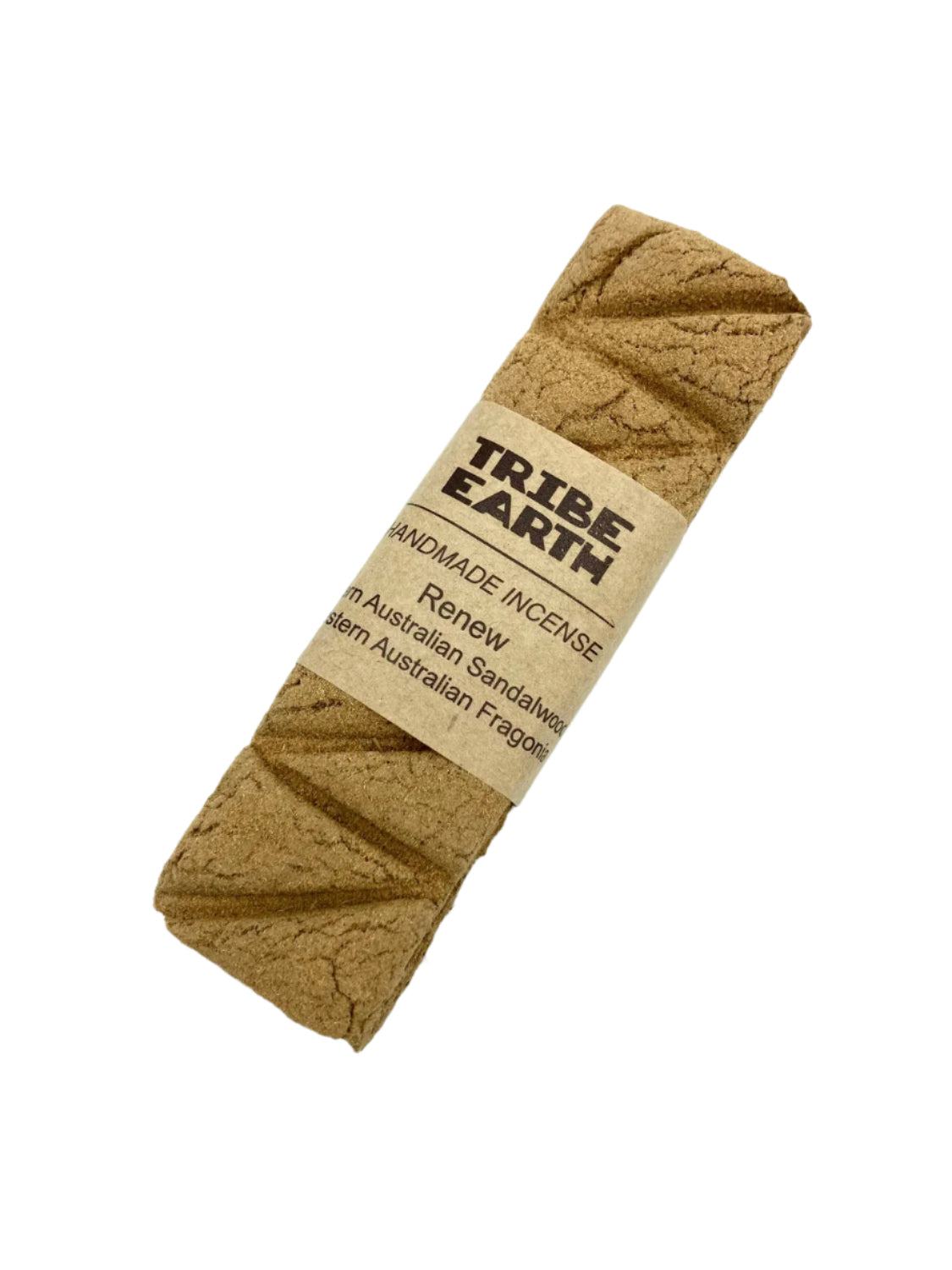 Tribe Earth RENEW Handmade Sandalwood and Fragonia Incense Plank burning on dish