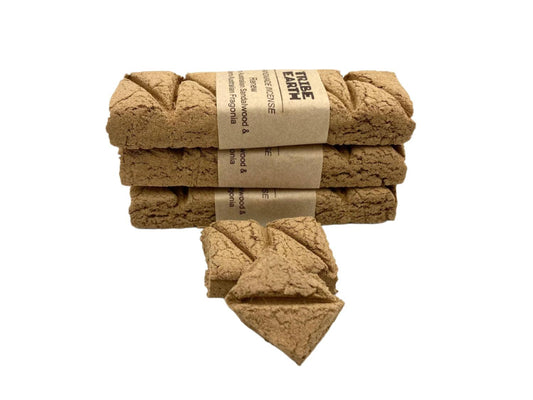 Tribe Earth RENEW Handmade Incense Plank with Sandalwood and Fragonia burning on heat resistant dish