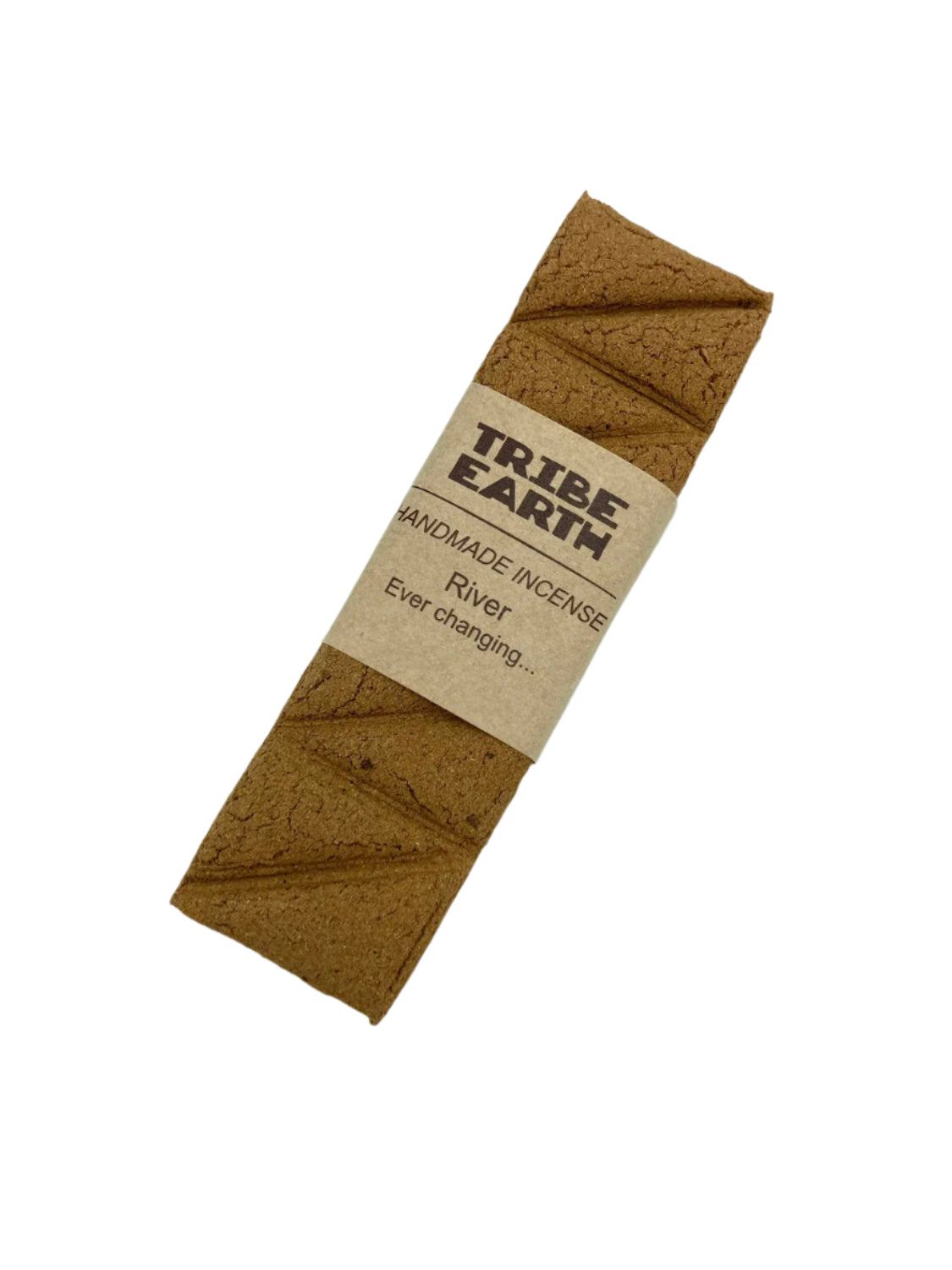 Tribe Earth RIVER Handmade Incense Plank with resins, flowers, and woods burning in heat-resistant dish