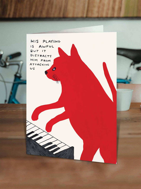Funny David Shrigley piano playing cat illustration on quirky greeting card with neon yellow envelope