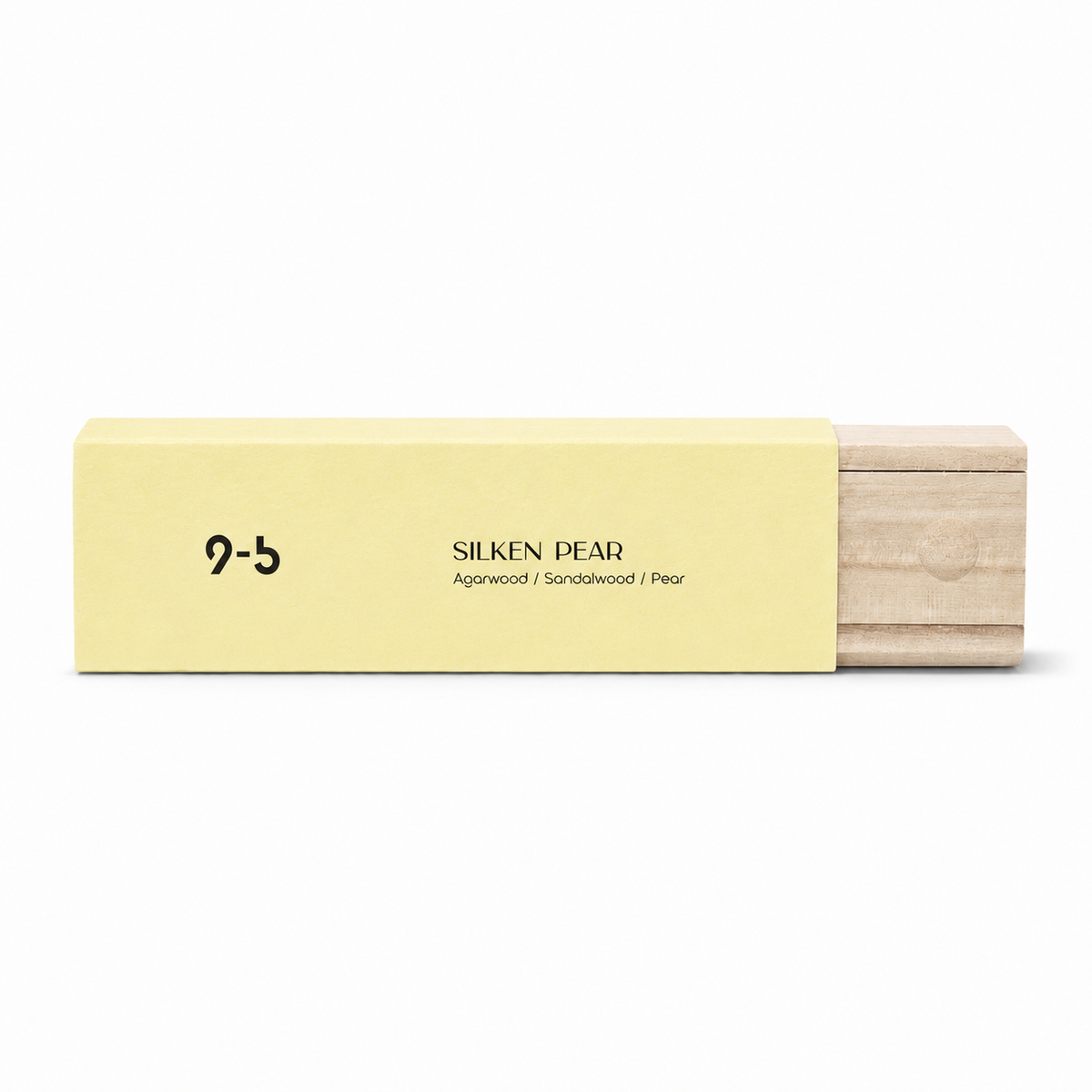 Incense sticks in a pale yellow sleeve labeled SILKEN PEAR, with exposed natural wood ends and pear notes. Natural Woods, Soft Pear: Meet Silken Pear Incense