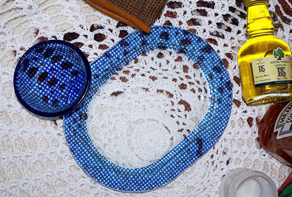 EDING blue glass plate and bowl set with white grid pattern and brown speckles on cream crocheted doily