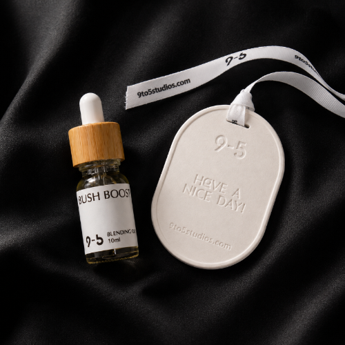 Bottle of Bush Boost and a 'Have a Nice Day' tag on a black background