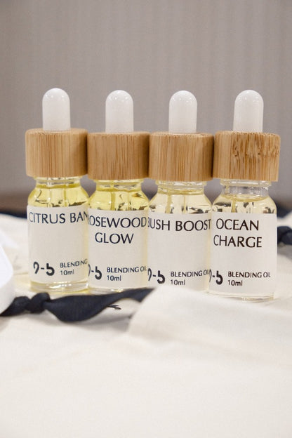 9to5 Studios Blending Oil 10ml lineup with Citrus Bang and Rosewood Glow on white surface