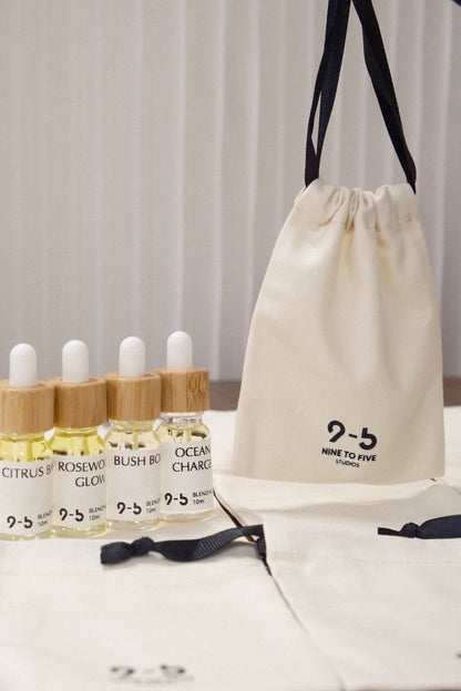 9to5 Studios four-piece blending oil set with pouch and ceramic tag