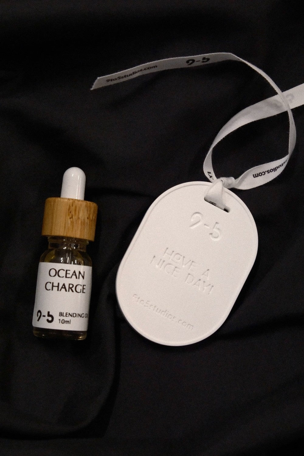 Ocean Charge blending oil by 9to5 Studios with bamboo cap and ceramic tag