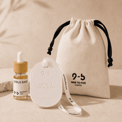 9to5 Studios white ceramic stone diffuser trio with Citrus Bang oil and branded pouch