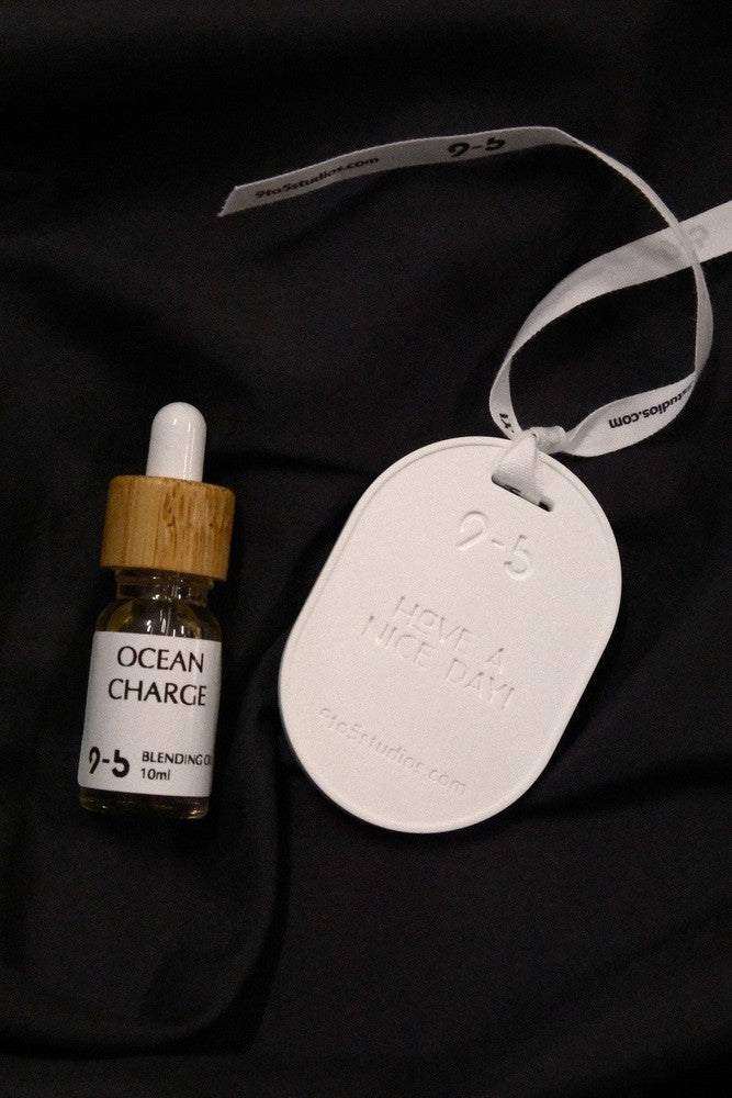 Ocean Charge blending oil by 9to5 Studios with bamboo cap and ceramic tag