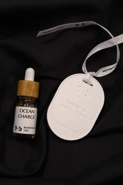 Ocean Charge blending oil by 9to5 Studios with bamboo cap and ceramic tag