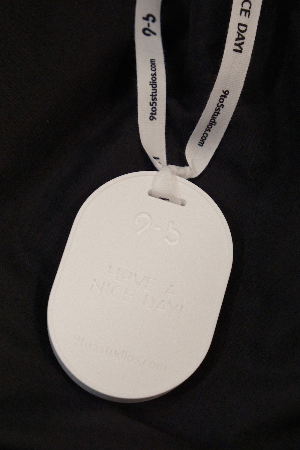9to5 Studios white ceramic diffuser with 'Have a Nice Day' embossed text and matte finish