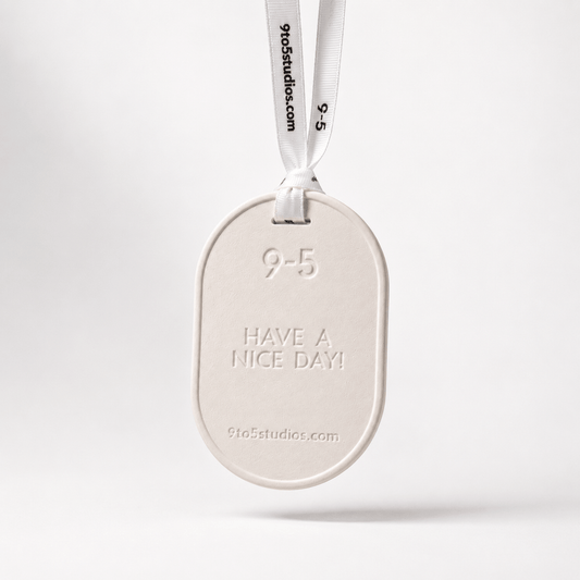White oval tag with 'Have a nice day!' text on a white background