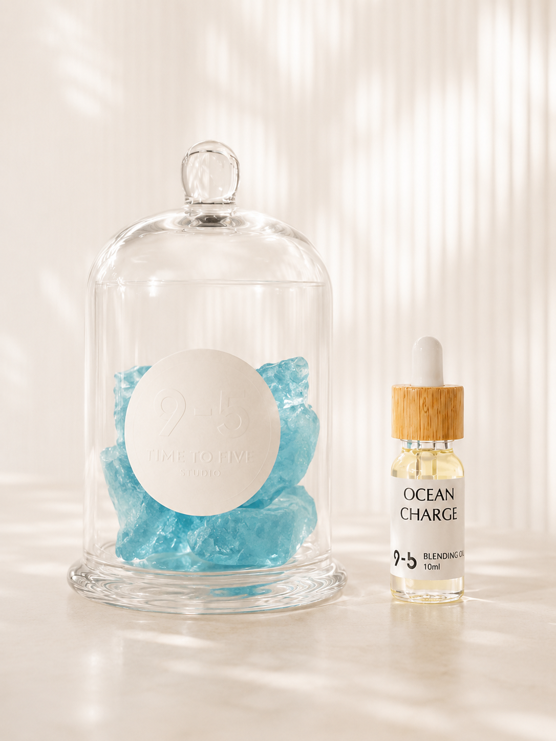 9to5 Studios Crystal Diffuser with Ocean Charge oil and light blue rough crystal stones