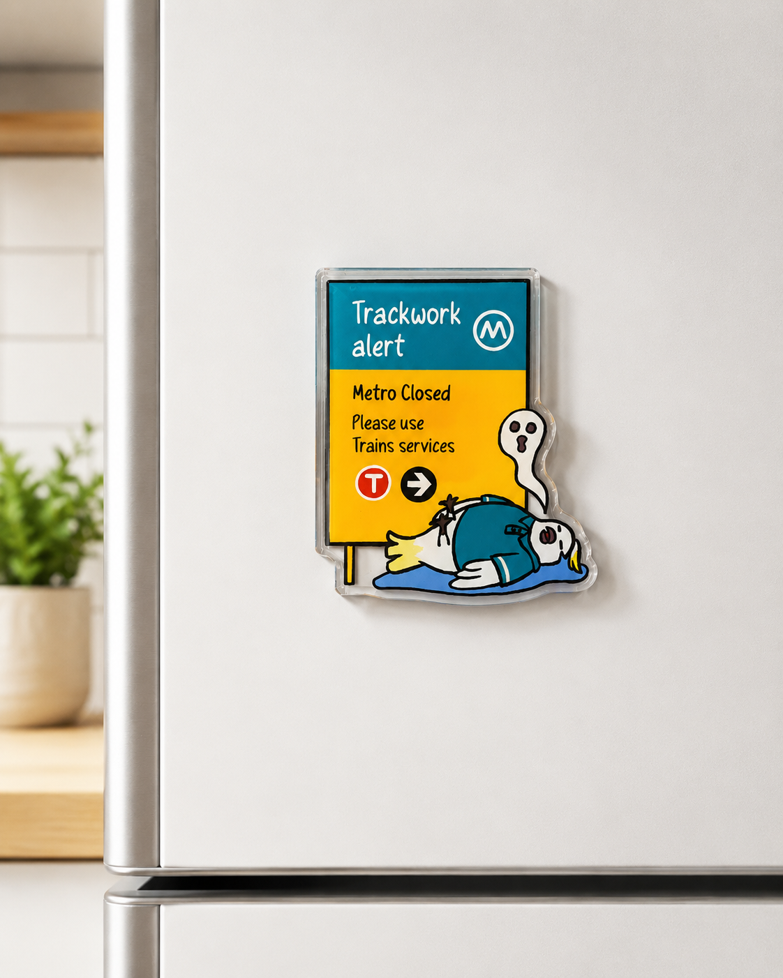 +61 Studio stainless steel fridge magnet featuring teal and yellow metro alert sign