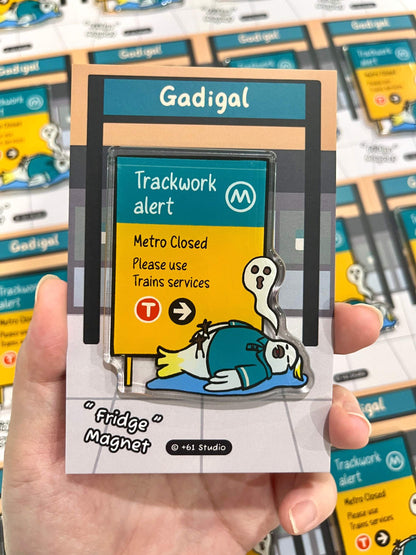 +61 Studio Gadigal Trackwork alert magnet held in hand with retail card packaging