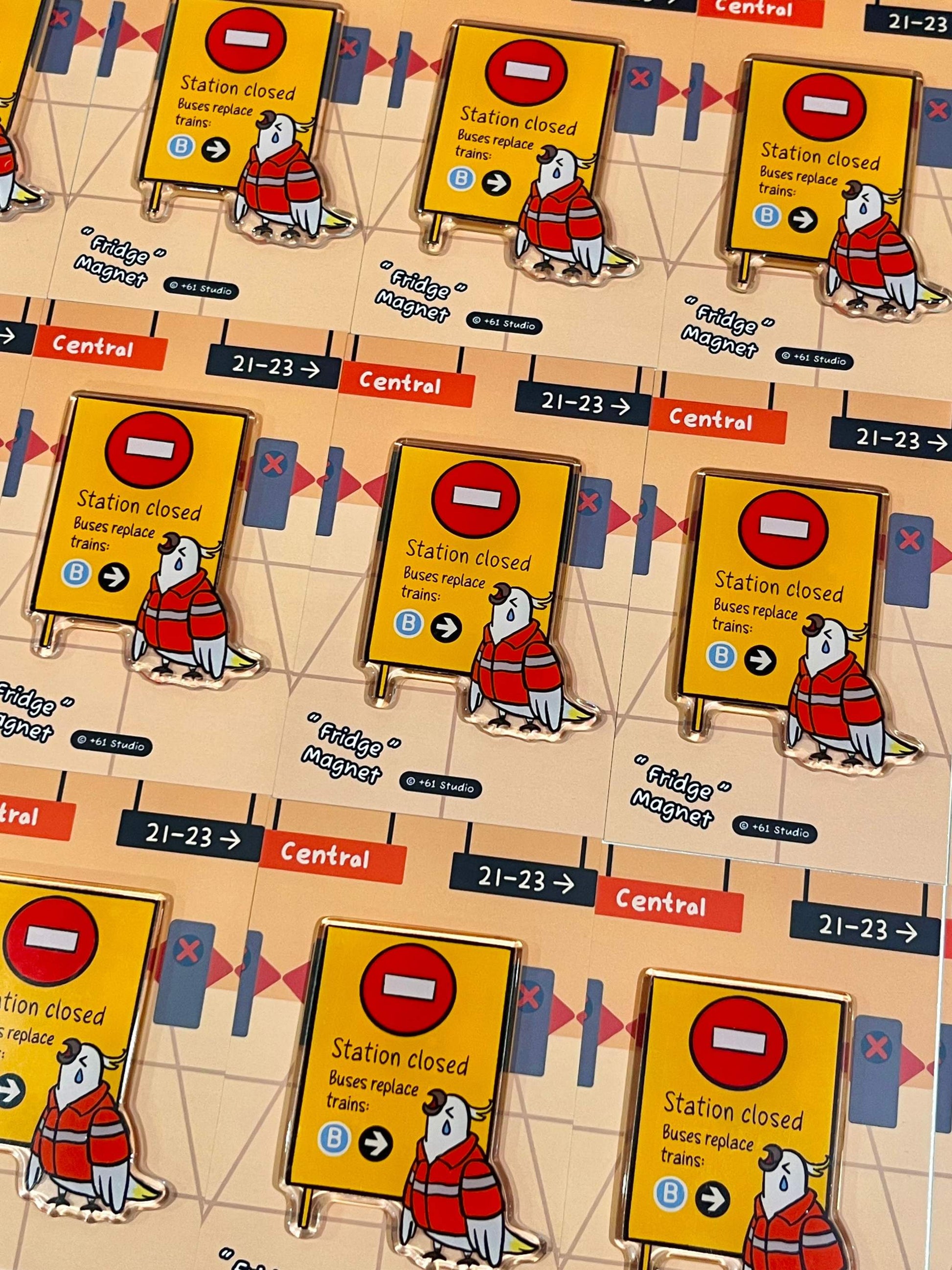 Bulk display of +61 Studio Station Closed fridge magnets in rows