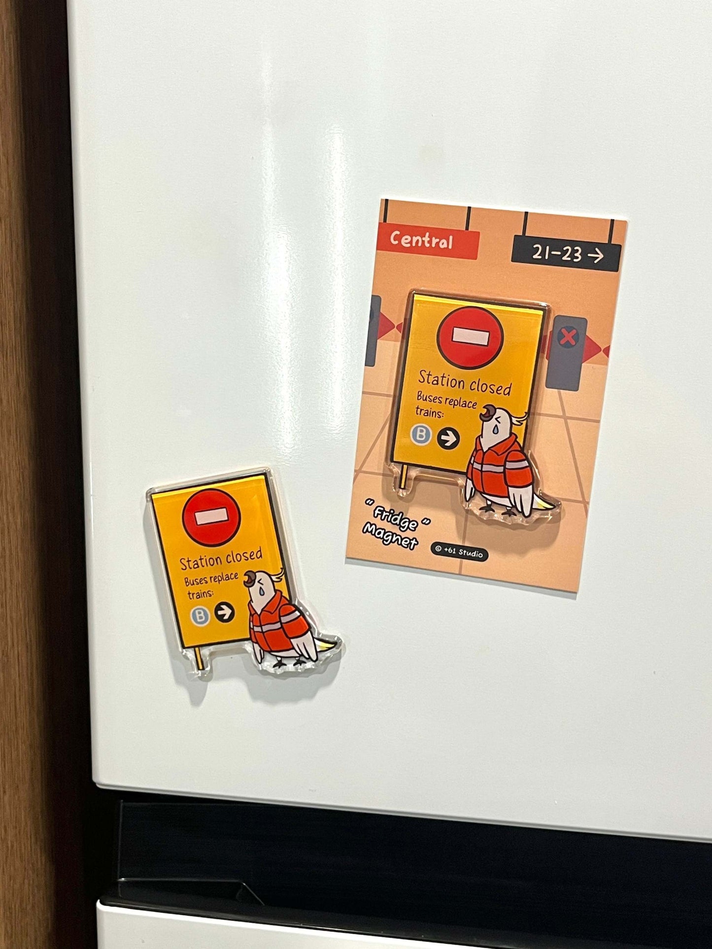 +61 Studio Station Closed magnet adhered to white refrigerator door
