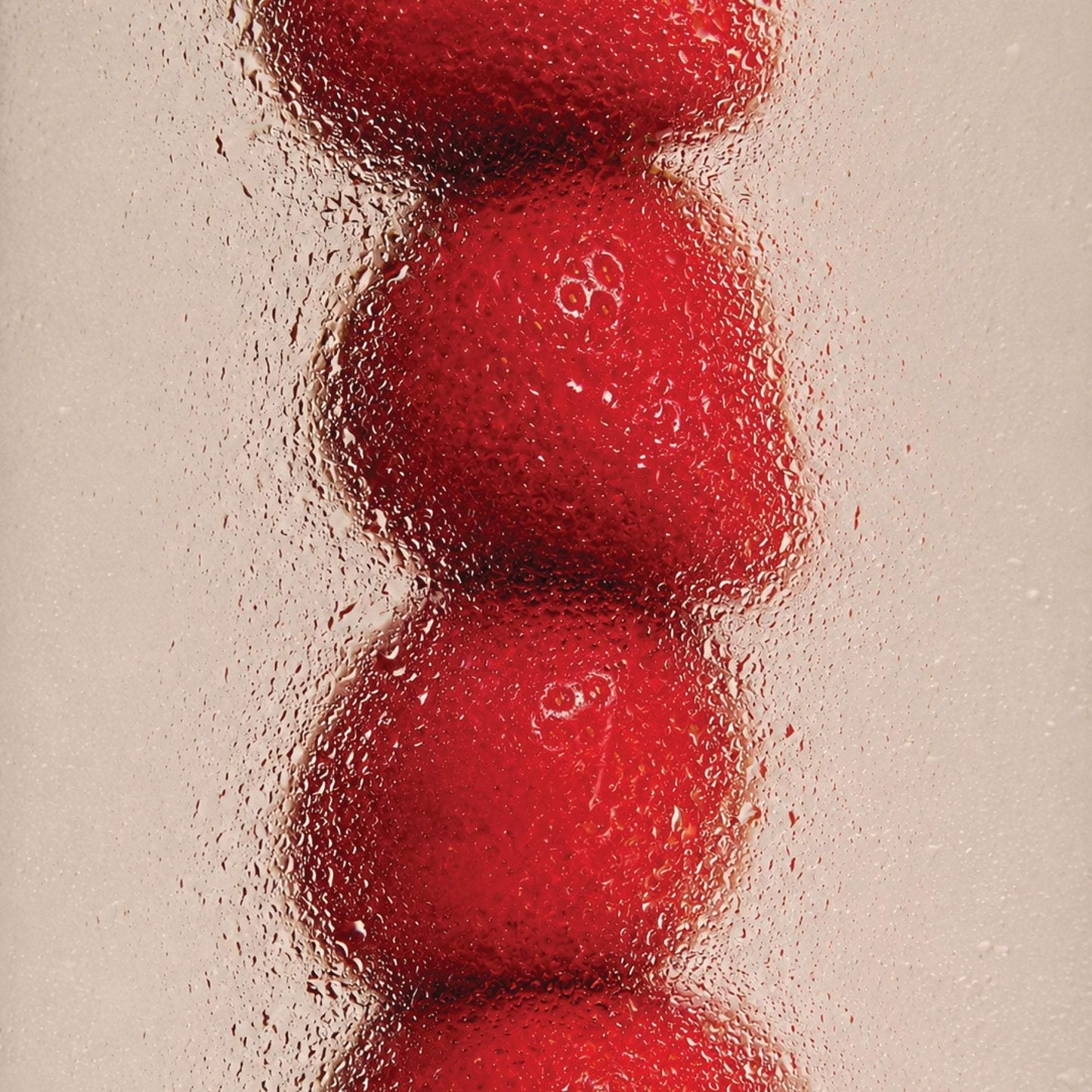 Fresh red strawberries behind frosted glass for Odesse Rose Wood by 9to5 Studios