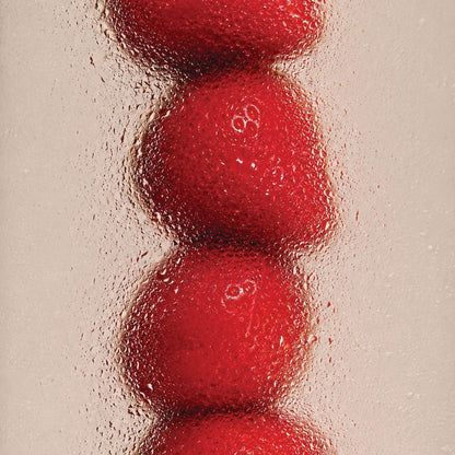 Fresh red strawberries behind frosted glass for Odesse Rose Wood by 9to5 Studios