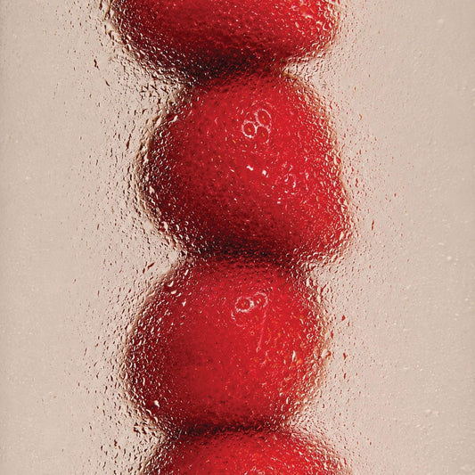Fresh red strawberries behind frosted glass for Odesse Rose Wood by 9to5 Studios