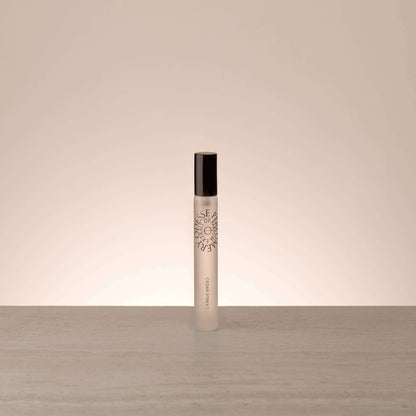 Odesse Travel Size Cedar Street Extrait De Parfum rollerball in frosted glass with matte black cap by 9to5 Studios