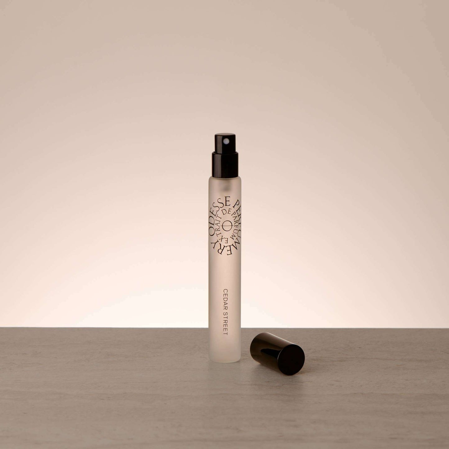 Odesse Cedar Street travel perfume bottle with removed spray nozzle showing atomizer mechanism by 9to5 Studios