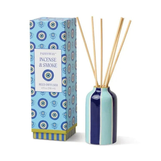 Paddywax Incense & Smoke reed diffuser in glossy light teal ceramic with navy stripe and wood reeds
