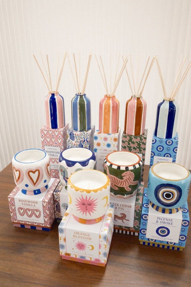 Full collection of Paddywax reed diffusers and candles featuring varied ceramic patterns and motifs