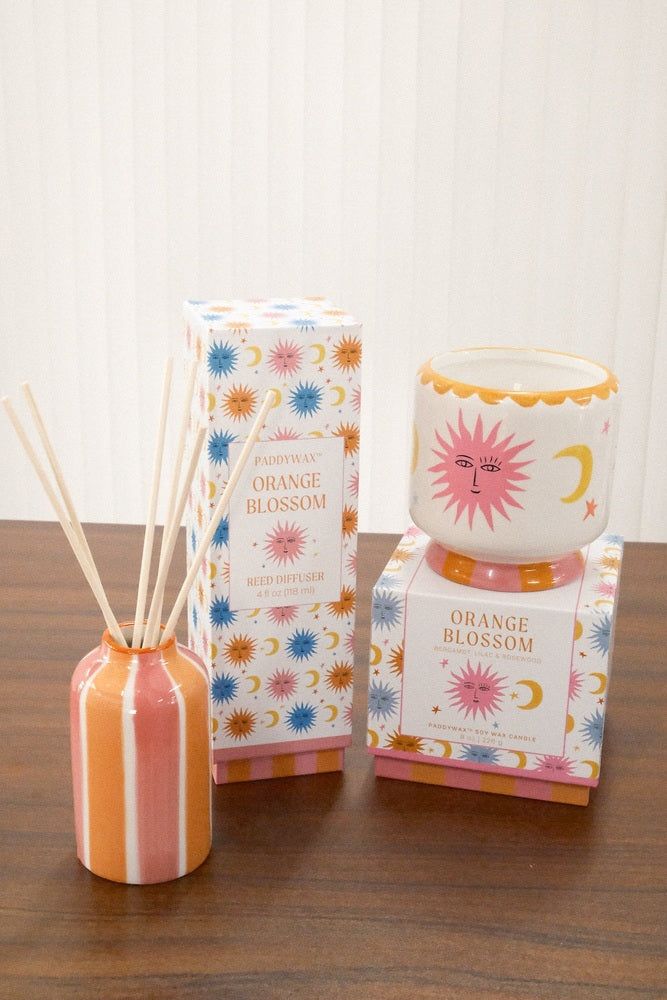 Paddywax A Dopo Sun Diffuser with orange blossom scent in ceramic sun motif vessel
