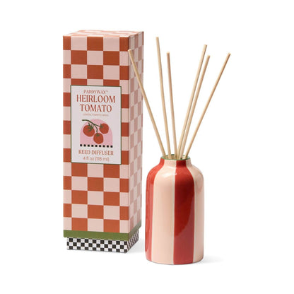 Paddywax Heirloom Tomato reed diffuser in terracotta and cream ceramic with bamboo reeds beside packaging