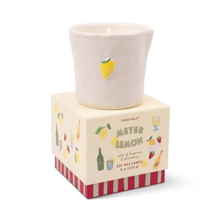 Paddywax Bistro Meyer Lemon ceramic candle with yellow lemon embossment on matte off-white soy wax, displayed on branded box