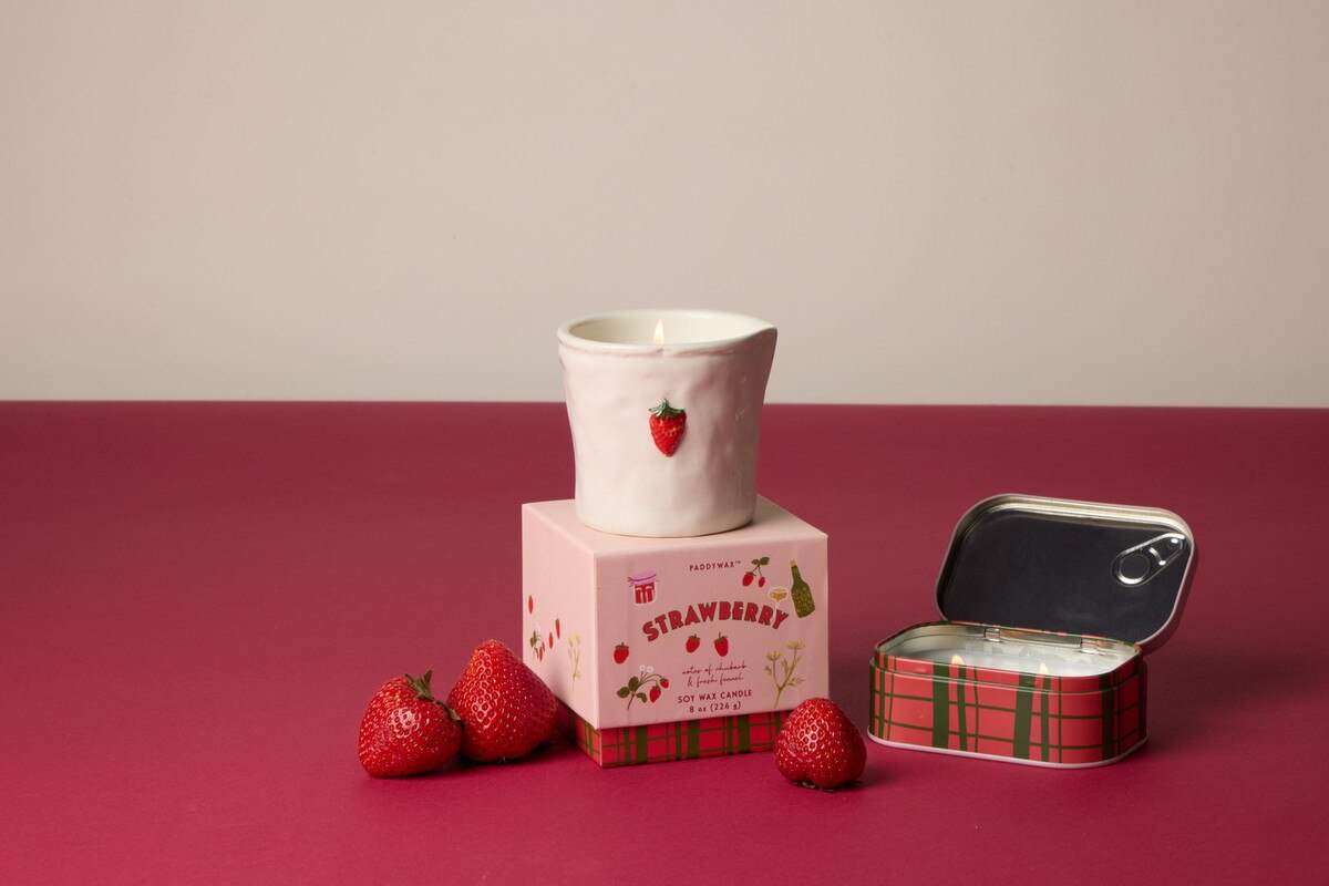 Paddywax Bistro Strawberry ceramic candle with red strawberry appliqué on pink plaid packaging
