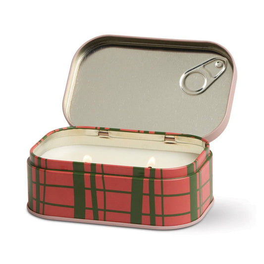 Lit Paddywax Bistro Strawberry candle showing warm glow from two flames inside plaid tin