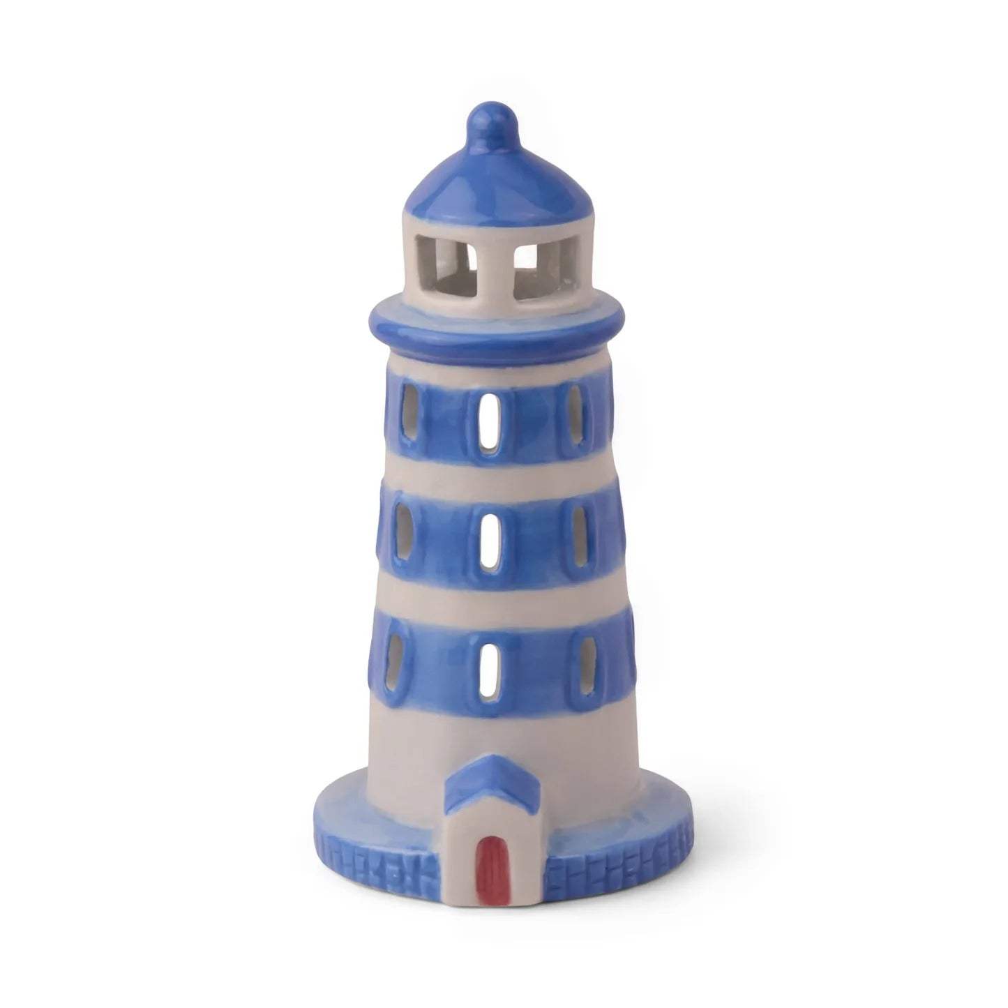 Side view of PADDYWAX cobalt blue and white painted ceramic lighthouse with brick-textured base and circular windows