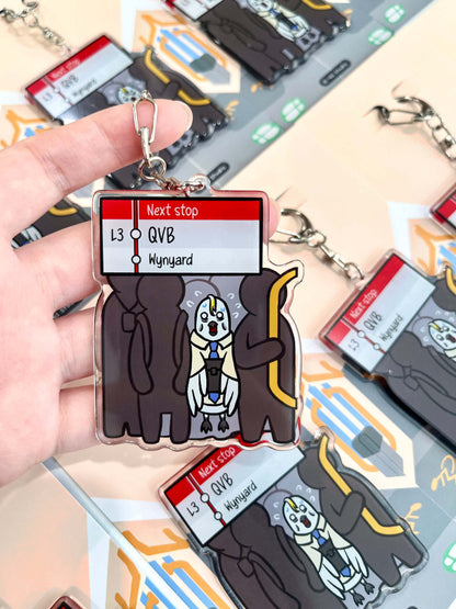 Close-up of 9to5 Studios Sydney light rail keychain showing glossy premium acrylic texture and die-cut cockatoo design
