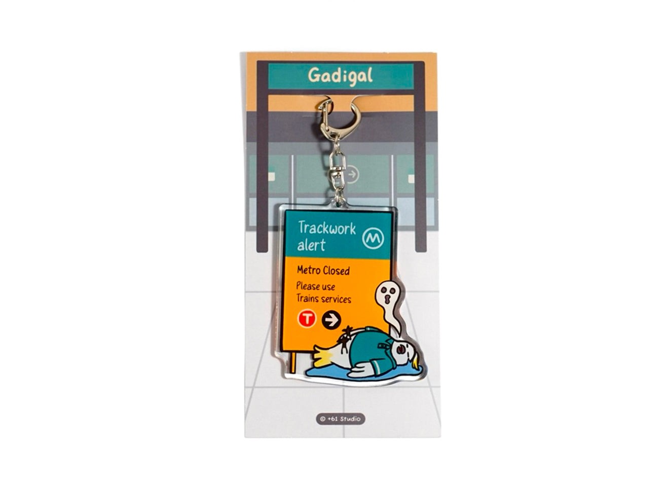 +61 Studio Metro trackwork alert keychain featuring a flat white cockatoo illustration on premium optical acrylic with metal clasp