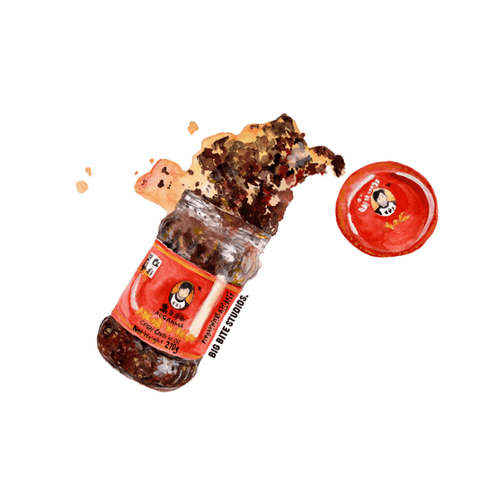 Angled Laoganma Chilli Oil magnet showing spilled oil and seeds detail